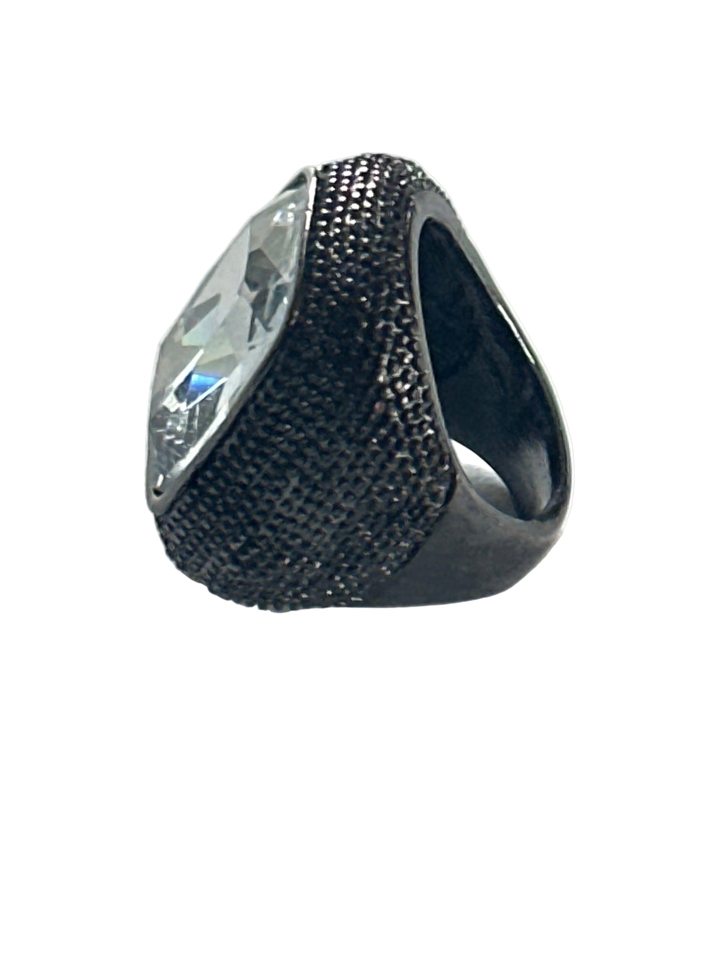 Silver-tone ring with a striking stone