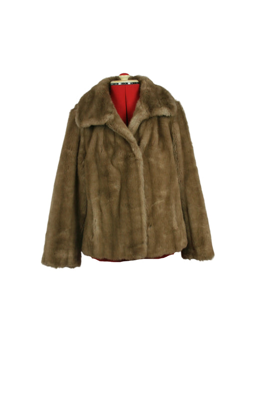 Late 1960s champagne faux mink jacket in authentic Mod style.