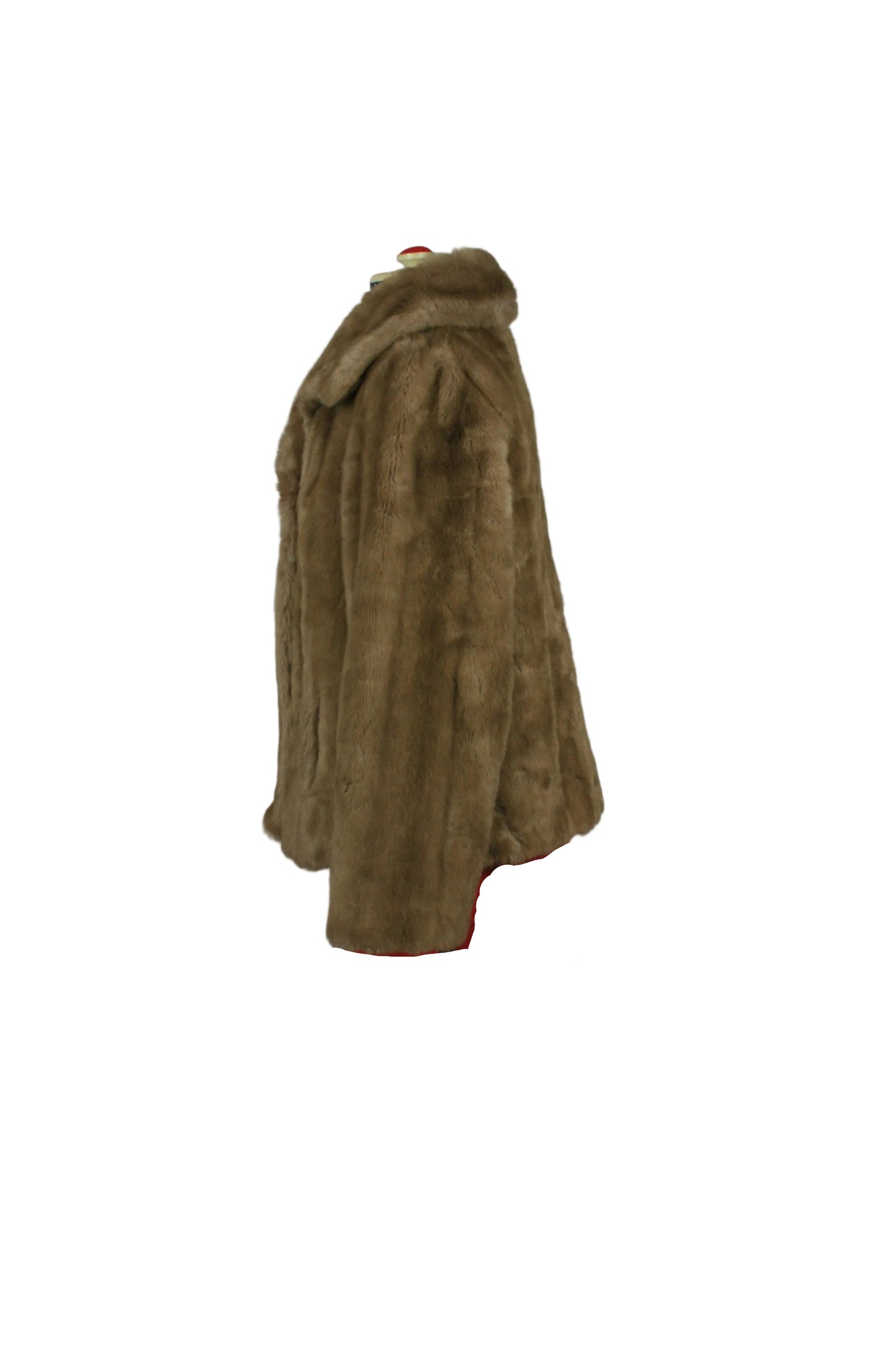 Late 1960s champagne faux mink jacket in authentic Mod style.